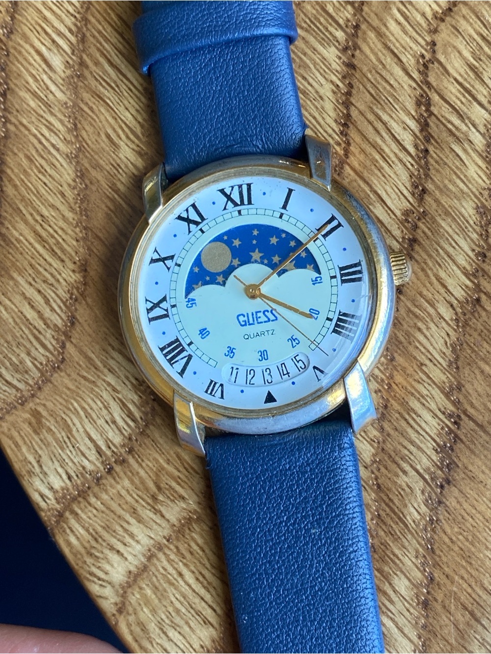 GUESS Blue Leather Strap Gold-Tone Moonphase Watch.